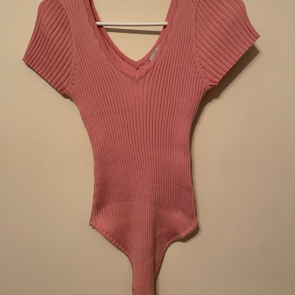Pink, ribbed thong bodysuit by Fashion Nova in large